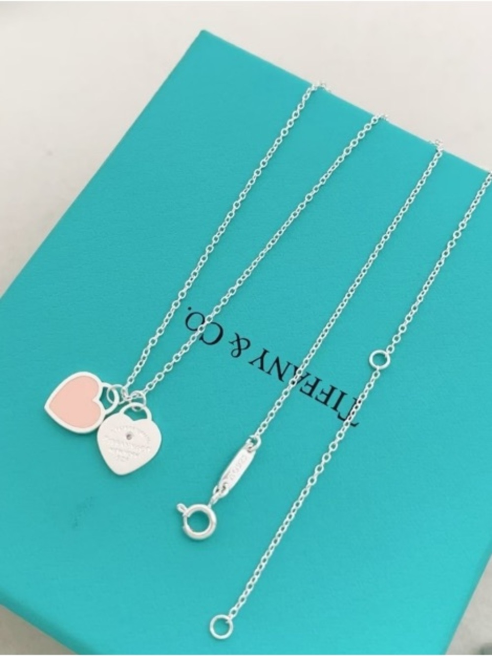Tiffany & Co. Sterling Silver Necklace with Pink Heart Tag